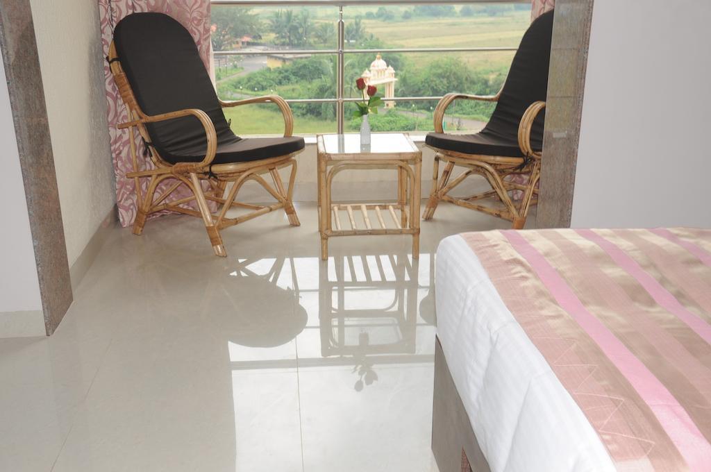 Boshan Hotels Mapusa Zimmer foto